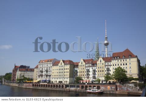 Germany, Berlin, Mitte, Fernsehturm seen from across River Spree.