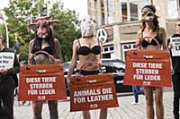 A group of people protest against the use of furs 