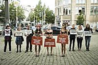 A group of people protest against the use of furs 
