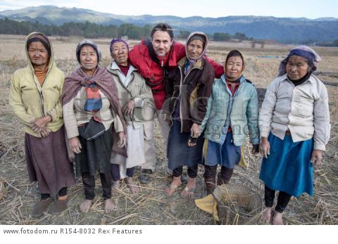 Mandatory Credit: Photo by Solent News/REX Shutterstock (4909075k)
Some of the Apatani women with their facial tattoo and nose plugs with photographer Cezary Wyszynski
Apatani tribal women, Arunachal Pradesh, India - Apr 2015
*Full story: http://www.rexfeatures.com/nanolink/qoi2
A photographer was given unique access to incredible tribal women who each have the same facial tattoo and nose plugs. Cezary Wyszynski, 38, stayed with the Apatani people in India whose women all went through the dramatic face-changing ritual when they had their first period. A guide took Cezary through their villages in the Ziro Valley in Arunachal Pradesh, India, where the last known 'plugging and tattooing' happened in 1972. The ancient tradition no longer takes place but women aged over 50 still display their remarkable wooden nose plugs - while others have removed them and had plastic surgery afterwards. The reason the younger women do not have the same distinctive features is because when they mixed with people from other cultures people declined to mix because they looked so unusual.